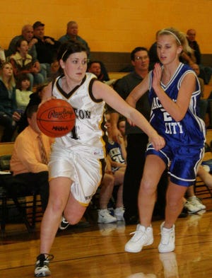 Pellston’s Emily Maglothin (1) drives around Mackinaw City’s Hannah Morse during the first quarter of the non-conference match up in Pellston, Wednesday.