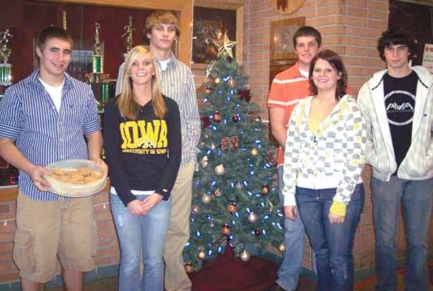 Several of the students who will be delivering Christmas cookies are, left to right Joe Sierens, Aron Jackson, Heath Rakestraw, Kane Vandersnick, Alyssa Morosko and Eric Thurston.