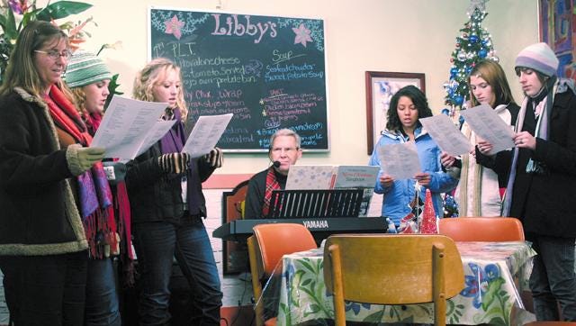 Downtown Cheboygan merchants hosted a hospitality night Thursday, featuring deals and entertainment. Tribune columnist Jack Barber performed at Libby's Restaurant, along with Cheboygan High School French teacher Maggie Sturvist and students Kristin Campeau, Katheryn Ashbaugh, Alison Bur, Mariah Agee and Kelsey Libenow.