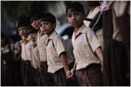 Schoolboys joined others on Friday evening in a human chain at a college in Mumbai in remembrance of the victims.