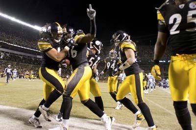 The Times/KEVIN LORENZI Steelers' safety Troy Polamalu congratulates teammate Deshea Townsend after Townsend returned an interception for a touchdown during the Steeler's 20-13 win over Dallas.