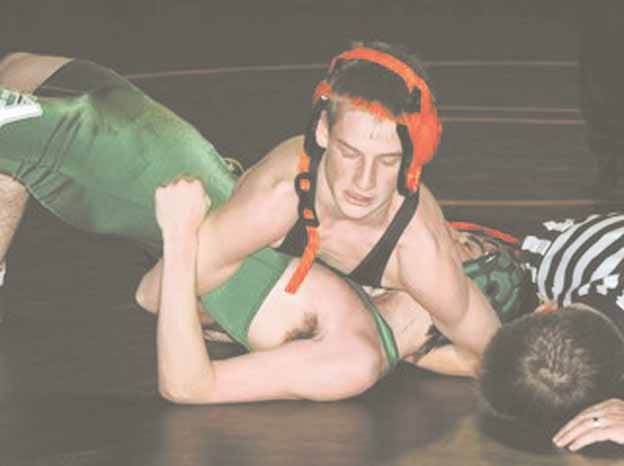 Kewanee’s 119-pounder Trae Walters tries to secure the pin for the Boilers in wrestling action over the weekend.