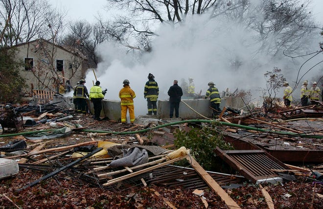 An explosion at a single family home at 27 Turner Rd in Scituate leveled the home and damaged at least four others so significantly they were uninhabitable. Emergency personnel scour the scene searching for victims. One fatality was confirmed.