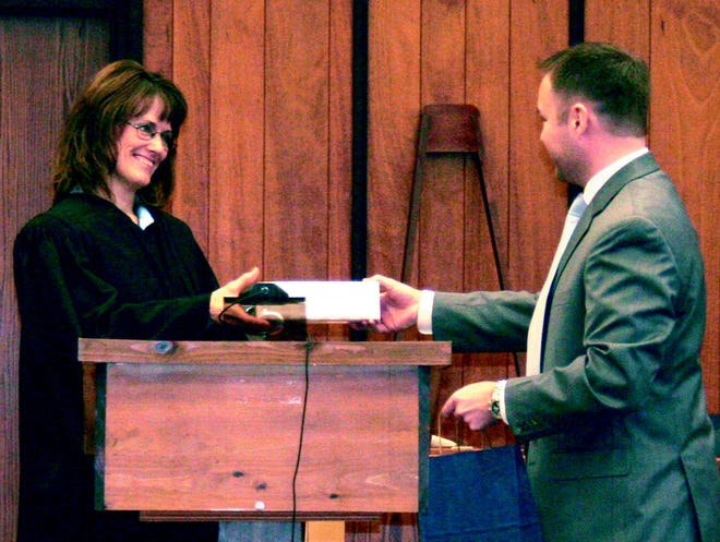 At 3 p.m. on Thursday, Maria Barton was sworn in as 89th District Court Judge, succeeding the retired Harold Johnson. Only moments after donning her robe for the first time, Barton was handed her gavel by Cheboygan County Bar Association President Mike Ekdahl.