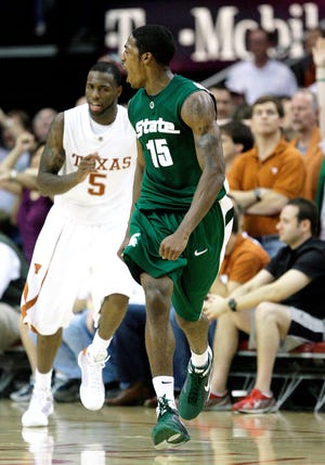 Michigan State guard Durrell Summers reacts after hitting the go-ahead shot against Texas during the second half of an NCAA college men's basketball game Saturday, Dec.20, 2008, in Houston, Texas. Michigan State won 67-63. (AP Photo/Bob Levey)