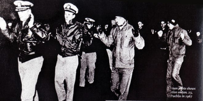 This North Korean photo shows the crew of the USS Pueblo being taken captive on Jan 23, 1968. the_image scanned from "Time 1968 the Year that Changed the World" book.