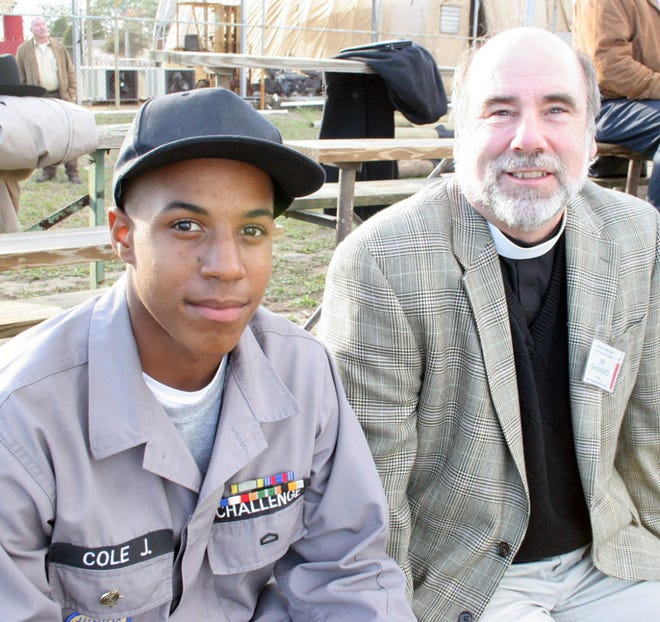 Father Jim Shumard with Cadet Jackson Cole