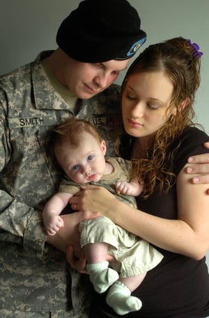 Weymouth-born soldier Joshua Smith, 23, was sent home from Afghanistan early to see his newborn son, Josh, and to care for his ailing wife, Dina. Smith’s battalion is due to return home in January.