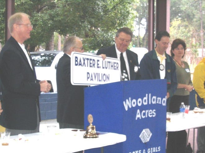 Benefactor Baxter Luther (center) of the Rotary Club of Arlington. The pavilion has been named in his honor.