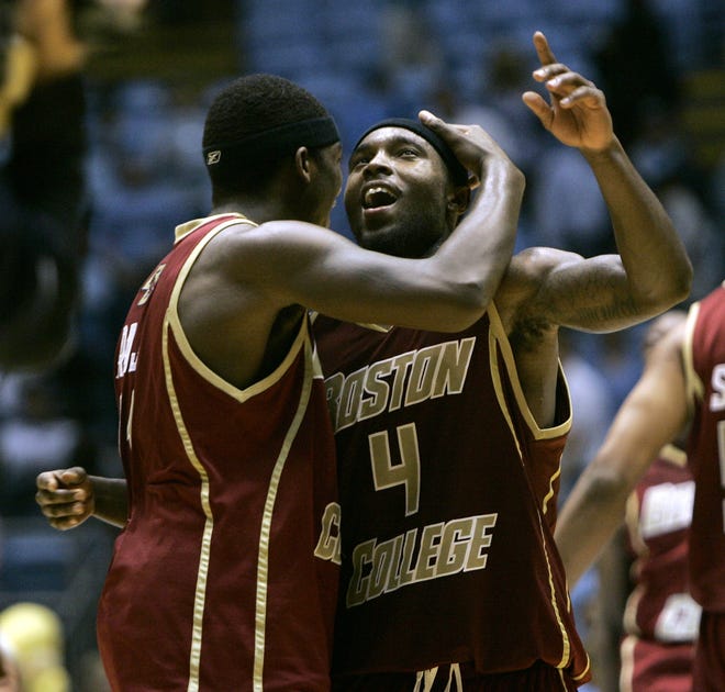 Boston College's Tyrese Rice (4) and Corey Raji celebrate after the Eagles knocked off previously unbeaten and No. 1-ranked North Carolina in Chapel Hill.