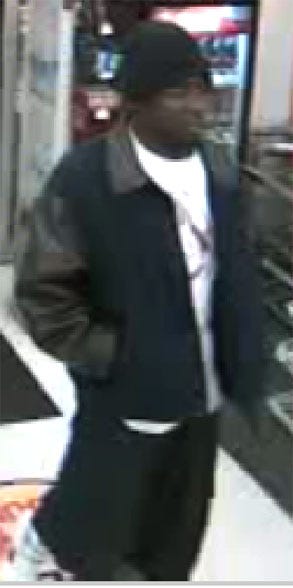 Surveillance camera picture of the suspect in the Dec. 31 robbery at CVS Pharmacy, 3404 Archer Road, this week.