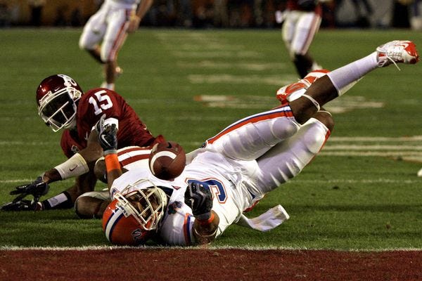UF receiver Louis Murphy tumbles into the end zone to score the Gators' first touchdown in Thursday night's game.