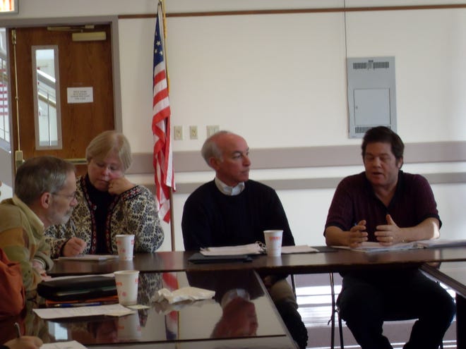 U.S. Rep. Joe Courtney, D-2nd District, (second from right) listens as John Blake, (right) President of the Connecticut chapter of the Sierra Club, voices his environmental concerns at a round table discussion hosted by Courtney Saturday at Colchester Town Hall. Also pictured are David Sutherland (left) of Nature Conservancy, and Charleen Cutler, (second from left) of the Last Green Valley.