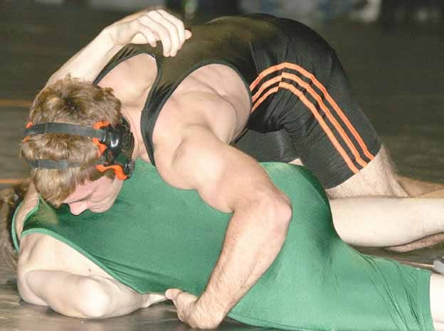 Kewanee wrestler Adam Breedlove, pictured in action earlier this season, notched his 100th career win Saturday.