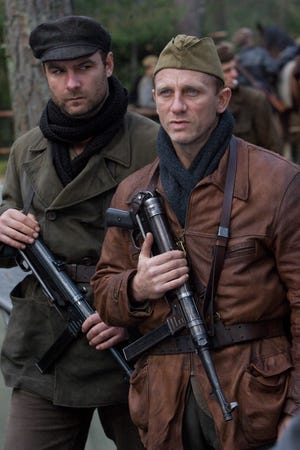 Liev Schreiber, left, and Daniel Craig are shown in a scene from, "Defiance."