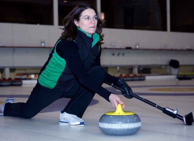 Framingham resident Nicole Vassar delivers a stone at Broomstones Curling Club in Wayland. She is going to the U.S. Olympic trials in Denver next month.