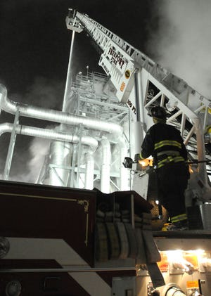 Freeport firefighters joined area departments at the Badger State Ethanol plant in Monroe on Monday. Freeport was asked to bring its ladder truck to the fire, which broke out at 2:30 Monday afternoon.