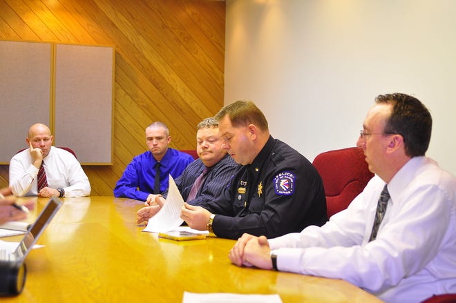 Authorities from Canton Police Department discuss problems involving the increasing misuse of prescription drugs and arrests local police have made in recent months for drug and weapons offenses. From left are detectives Keith Grant and Greg Mills of the Special Operations Division of Canton Police Department, Lt. Dean Putman, Police Chief Dan Taylor and Sgt. Rick Nichols of the department.