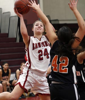 Westborough's Leah Murphy hangs in the air as she shoots during the Rangers' victory over Marlborough.