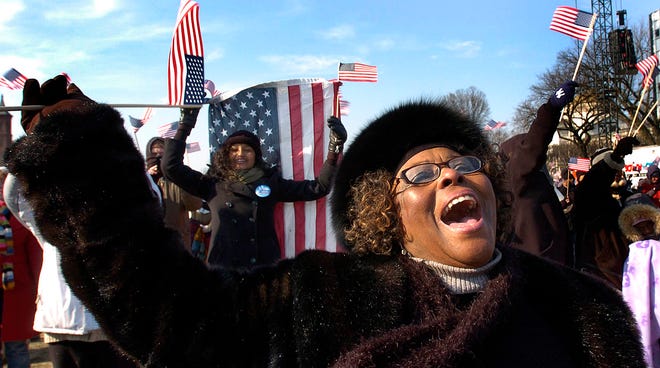 Jossie Redmond, 93, of Crawford, Miss.,shows her feelings as Barack Obama becomes the nation's 44th president.