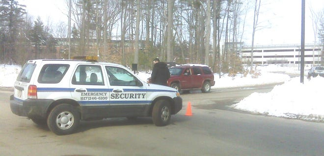 Security guards blocked the entrance to the Blue Cross Blue Shield offices on Technology Park Drive on the Hingham-Rockland line after an unidentified white powder was found on an envelope.