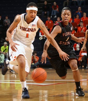 Virginia forward Lyndra Littles, left, fights for a loose ball with Florida State guard Angel Gray, right, Friday in Charlottesville, Va.