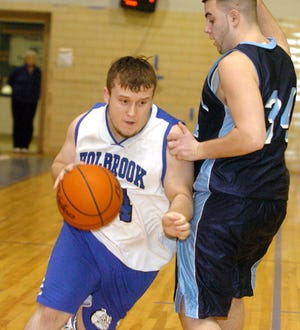 Holbrook's Tyler Richards dribbles against Bristol-Plymouth's Mike Steininger during the Craftsmen's 71-69 victory on Saturday.