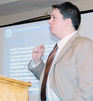 Steven Procopio, director of accountability and research at the Louisiana Division of Administration, demonstrates the LaTrac Web site during the Ascension GOP Roundtable meeting Thursday at the Holiday Inn in Gonzales. The site includes a database of state expenses.