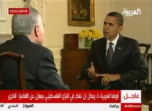 In an image made from a video provided by Al-Arabiya, President Barack Obama is interviewed in Washington by Dubai-based Al-Arabiya cable network Monday Jan. 26, 2009. It was the Obama's first formal television interview as president given to an Arabic cable TV network.