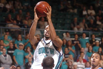 UNCW's Montez Downey shoots for two against the St. Andrew Knights in an exhibition basketball game at Trask Coliseum on Thursday.