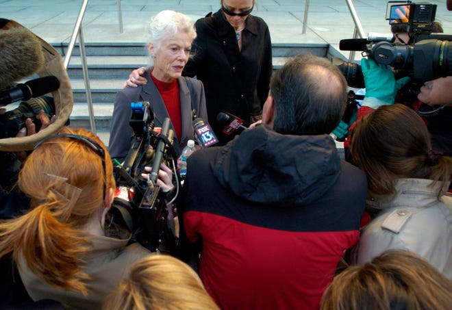 Peg Nadel, the wife of hedge fund manager Arthur Nadel, gives a statement to the media after his bond hearing Friday at the federal courthouse in Tampa. She said she felt “blessed” by the support she has received from family, friends and even some investors.