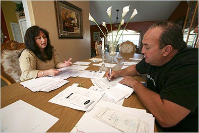 Rosa and Carlos Benitez hope bankruptcy will help them keep their three-bedroom house in Palm Coast, Fla.
