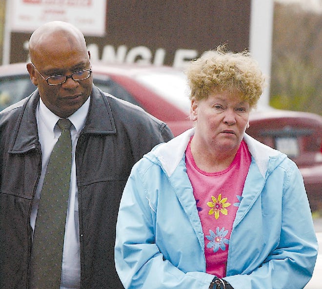 Glenda Rae Masciarelli is escorted by Pennsylvania State Trooper Jeffrey Ramsey after being arrested in Uniontown on Nov. 3, 2006. Masciarelli is accused of killing her 2-year-old son in 1976. He was found drowned, face-down in the shallow creek that bubbled past the railroad trestle near Masciarelli's home.