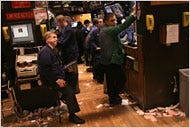 Traders on the floor of the New York Stock Exchange on Tuesday. The markets slid all day.