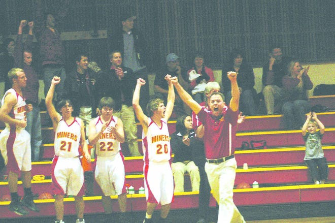 Yreka’s sideline, from left: Brandon Larreau,David Burrer, Tyler Moser, Brian Carter and head coach 
Christian Birch reacts after the final buzzer sounds in the Miners’ 53-51 thrilling win over CV.