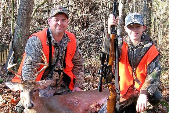 Jeffery Kelley, right, took this 130 pound, nine-point buck with a 12 inch spread on a hunting trip with his dad, Eric Kelley recently in Mississippi.