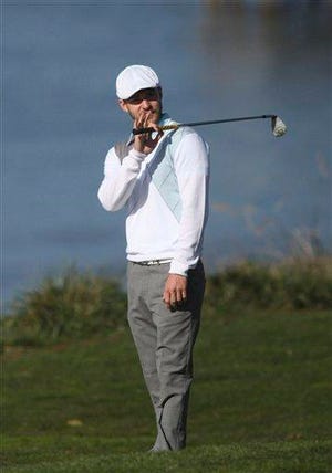 Justin Timberlake reacts after chipping his ball on the fourth hole at Pebble Beach Golf Course during the third round of the AT&T Pebble Beach National Pro-Am at Pebble Beach, Calif., on Saturday, Feb. 14, 2009.