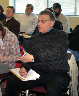 Franklin Town Engineer William Yardisernia asks a question at a state Department of Environmental Protection meeting on stricter stormwater runoff regulations on Wednesday.