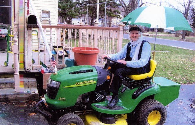 Tony Di Bona of Ashland, seen here on his converted riding lawnmower, lived life to the fullest right up to his death on Wednesday at 92.