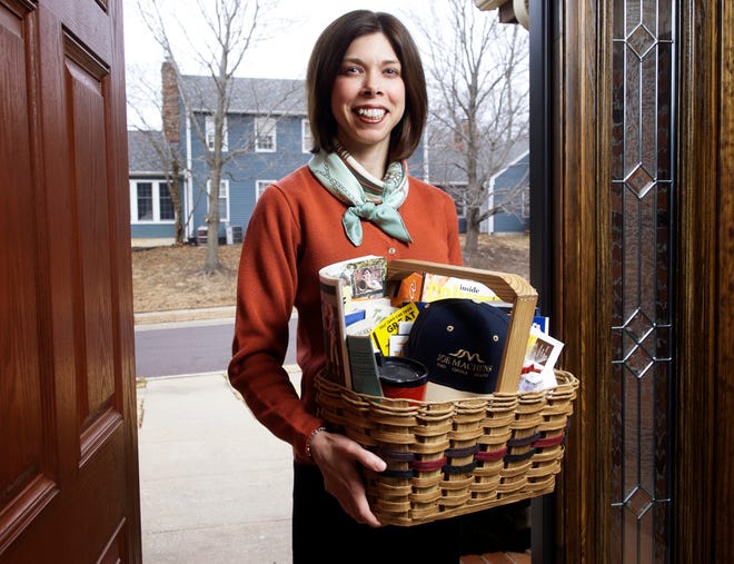 Stacey Thompson owns Columbia Welcome. Businesses and organizations pay Thompson to include their information and gifts in her welcome packages.