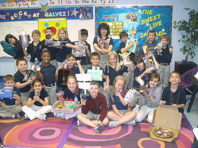 The second grade classes at Galvez Primary learned the value of recycling. The students used their imagination and created various sculptures made from common house hold garbage. The students then presented their creations to their class with an explanation of what trash was used and how they put it together. Pictured is Mrs. Grimball’s class with their “Trash to Treasure” projects. Some of the items created consisted of:  a trash pizza, a snow globe, several guitars, an airplane, a rocket ship,  a cat,  a basket,  a truck,  a pillow, a couple of piggy banks, a sailboat, a vase, a dinner tray, a doll, and binoculars.  Students are, from left, back row, Charity DeLeo, Troy Marks, Matthew Sapp, Adelaide Gaffney, Caleb Mayers, Sarah Herren, Dillon Parker, Logan Green, and Trace Normand; middle row, Jimmy Hamm, Makaesha Hickerson, Brendon Outlaw, Michael Landry, Isabelle Morgan, and Dane Shaw; and front row, Cody Acosta, Kolbi Richardson, Alexis LeBlanc, Ashton Arceneaux, Arianna Prudhomme, Katelyn Williams and Hayden Stafford.