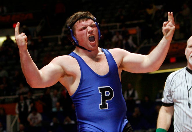 Purchase this photo at sj-r.com/reprints	
Ted Schurter/The State Journal-Register
Petersburg PORTA’s David Devine celebrates after defeating Mount Carmel’s Tanner Crum in the 285-pound title match Saturday at Assembly Hall.
