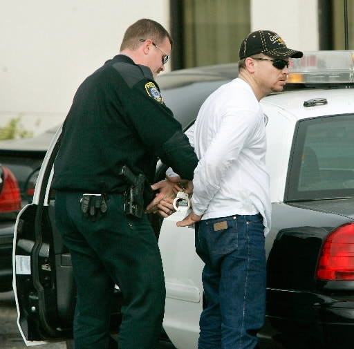 Oklahoma City police arrest one of two men after officers found materials used to make methamphetamine at a Motel 6 at SE 44th and I-35. Oklahoma City, Oklahoma February 23, 2009. BY STEVE GOOCH