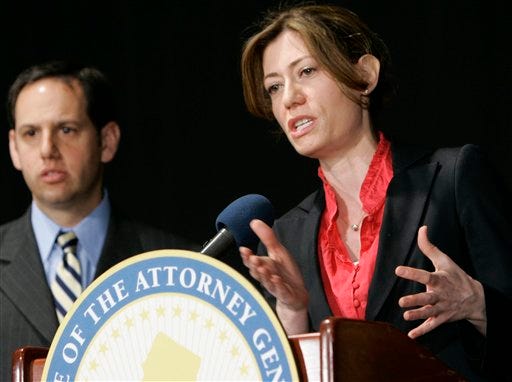 New Jersey Attorney General Anne Milgram speaks during a news conference in East Rutherford, N.J., Monday, Feb. 23, 2009, to discuss ticket sales for entertainment events by Ticketmaster. Milgram announced a settlement with Ticketmaster that changes the way the company sells tickets nationwide over the Internet. David Szuchman, left, director of the state Division of Consumer Affairs, looks on.