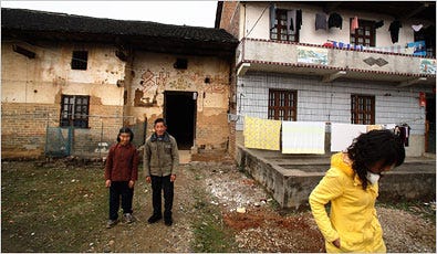 Tan Tianying, a migrant worker, at home with her grandparents in Tanjia village. Hundreds of employees at her uniform factory in Guangzhou have lost their jobs.