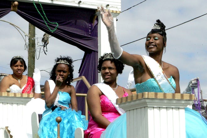 Maids ride in the Krewe of Ghana Parade Tuesday in Thibodaux. Ghana was the only parade to roll in Thibodaux on Mardi Gras. With the Mardi Gras season coming to an end, the 40 days of the Lenten season start.
