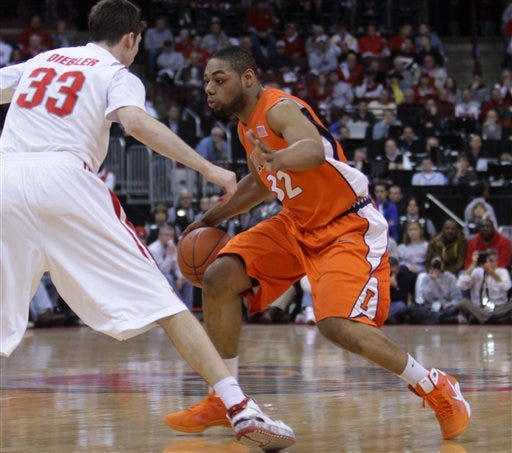 Illinois' Demetri McCamey, right, brings the ball upcourt against Ohio State's Jon Diebler during the second half of an NCAA college basketball game Sunday, Feb. 22, 2009, in Columbus, Ohio. Illinois defeated Ohio State 70-68. (AP Photo/Jay LaPrete)