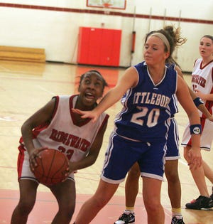 B-R's Amanda Brown goes up for the shot against Attleboro's Brittany Reynolds in Wednesday's Division I South contest at B-R.