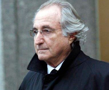 ** FILE ** In this Wednesday, Jan. 14, 2009 file photo, Bernard L. Madoff, the accused mastermind of a $50 billion Ponzi scheme, leaves Federal Court in New York. Madoff is seeking to keep a $7 million Manhattan penthouse and an additional $62 million in assets, saying they are unrelated to the fraud that authorities say cost victims more than $50 billion.