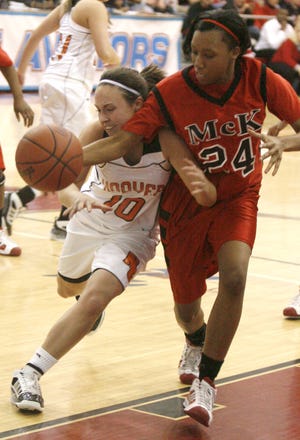 Hoover's Erica Iafelice and McKinley's Laneisha Lennon battle for a loose ball.